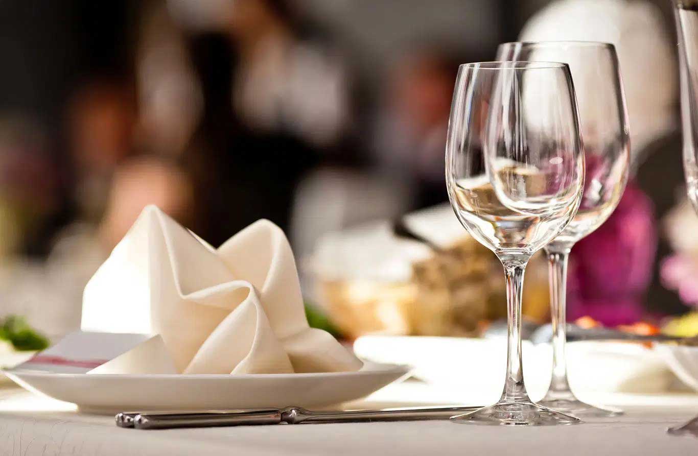house-building-800x400 Elegant table setting with folded napkin and wine glasses at a formal dinner